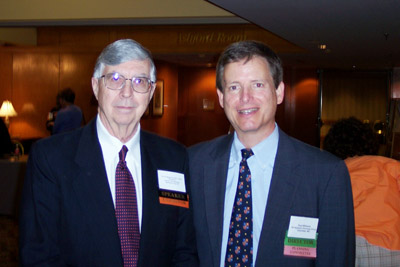 Speaker Dr. Carl Bogardus (left) and board member Paul Williams.