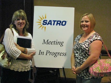 Presenter Liz Reynolds (L) with attendee