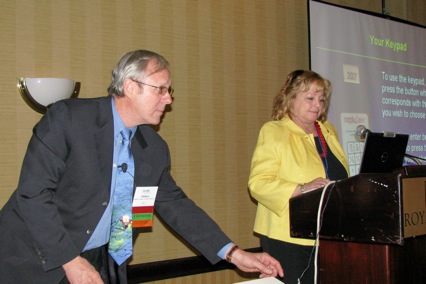 Jim Hugh and Linda Lively, AMAC, offer an interactive coding session