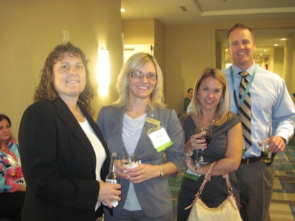 Attendees at networking reception